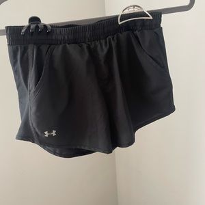 Under Armour shorts with built in underwear and pockets.